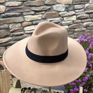 Elegant Tan Wide-Brim Hat with Black Band